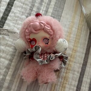 Skullpanda Pink Plush Doll with Heart Face and Ruffled Silver Accents